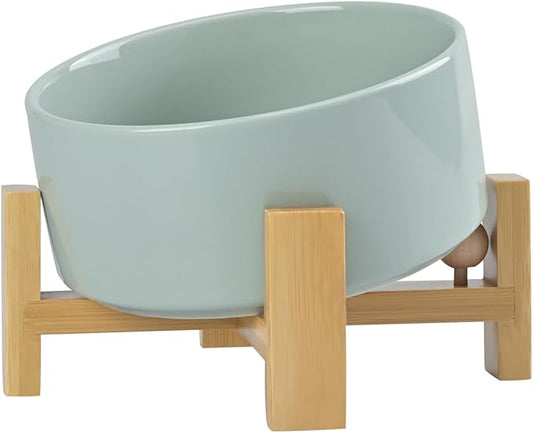 SPUNKYJUNKY 15° Slanted Ceramic Dog and Cat Bowl with Wooden Stand, Tilted Bulldog Food and Water Bowl No Slip Non-Spill for Cats Medium Dogs Big Face Pets 28.7 OZ (3.6 Cups, Morandi Green)