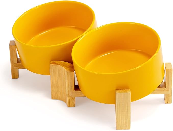 SPUNKYJUNKY 15° Slanted Ceramic Dog and Cat Bowl with Wooden Stand, Tilted Bulldog Food and Water Bowl No Slip Non-Spill for Cats Medium Dogs Big Face Pets 28.7 OZ (3.6 Cups, Yellow × 2)