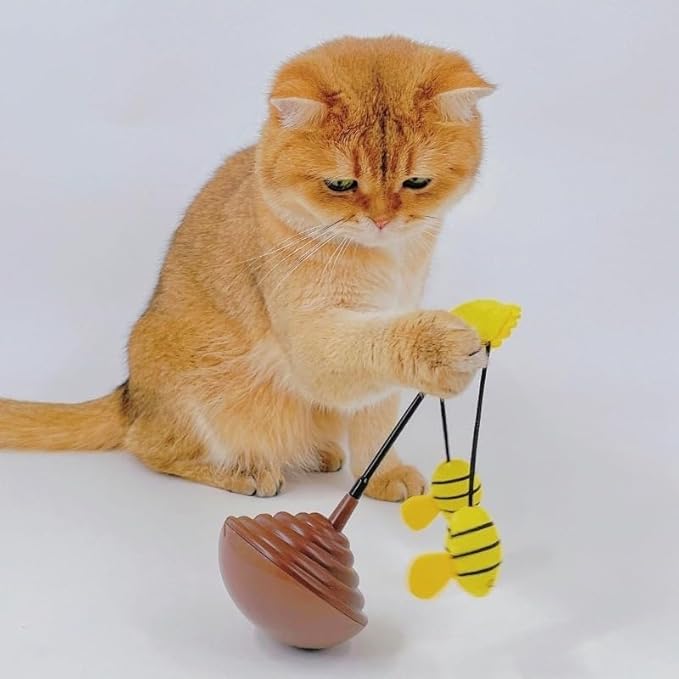 Wobble Cat Toy, an Adorable Interactive Rolling pet Toy Featuring Fun Sunflower Decorations and Feathers to Ignite Your Cat's Hunting Instincts.(Pink)