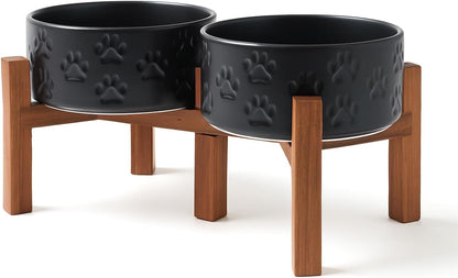 SPUNKYJUNKY Ceramic Elevated Dog Bowl Set with Acacia Wood Stand for Food and Water for Small Medium Sized Dogs (28.74 OZ, Black, Dog Paw Pattern)