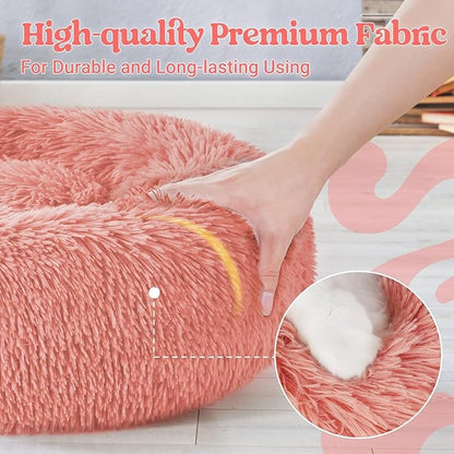 rabbitgoo Calming Dog Bed for Small Medium, 27 inches Pet Bed Machine Washable, Non-Slip Round Fluffy Plush Faux Fur, Soft Donut Cuddler Cushion for Small Dogs, Pink