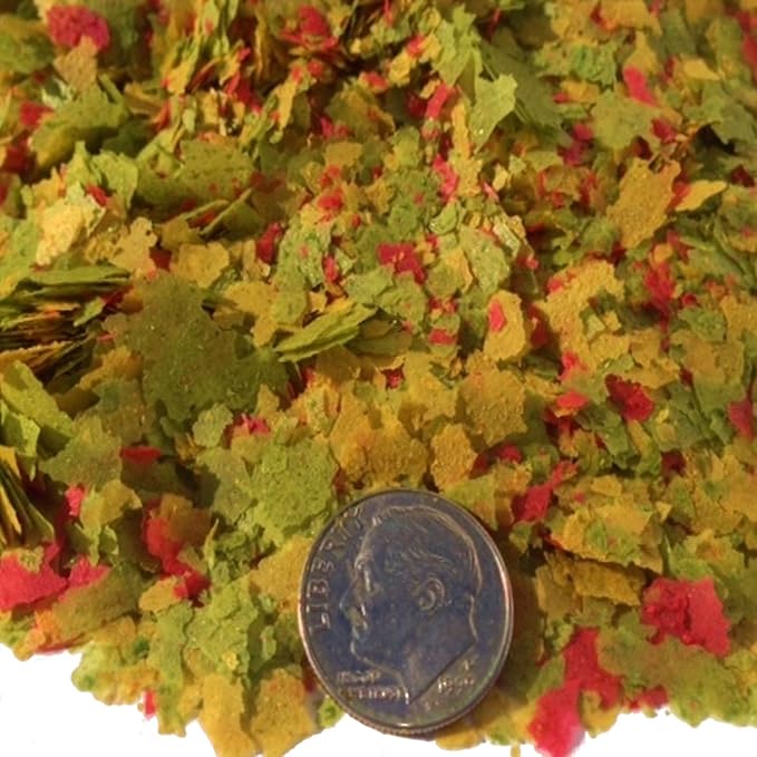 Aquatic Foods Inc. Zeigler Small Flakes with Vita-Pack for Discus, Cichlids, Guppies, Goldfish, Angel Fish,Tetras, Livebearers, Bettas, All Community Tropical Fish. Zeigler…1/2-lb